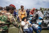 Cérémonie de remise officielle de 315 moto-tricycles par le couple présidentiel aux personnes à mobilité réduite